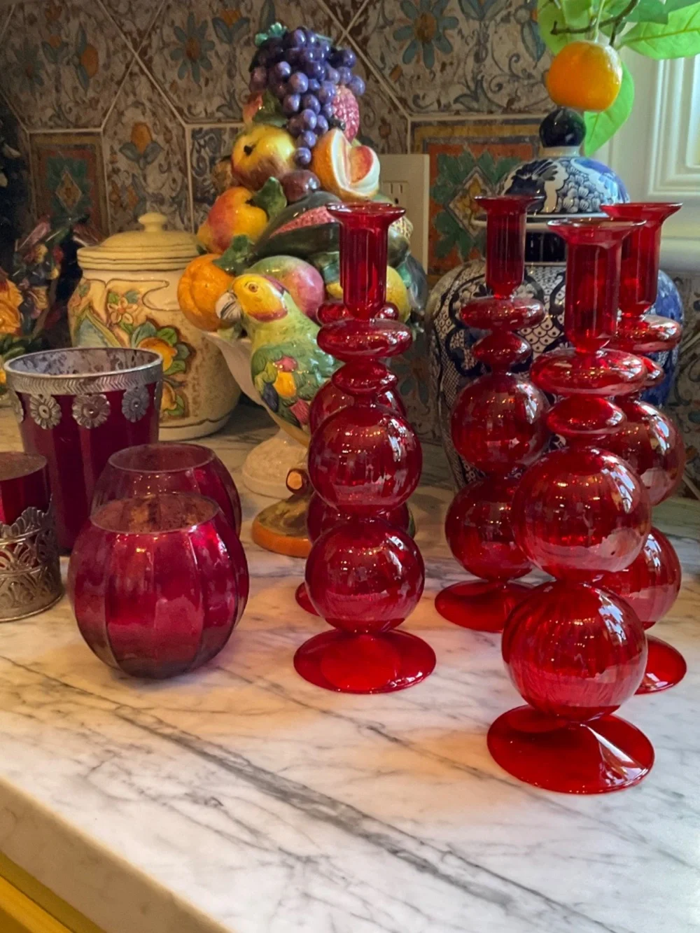 Set of lovely gathered red glass candlesticks, votive holders and vases